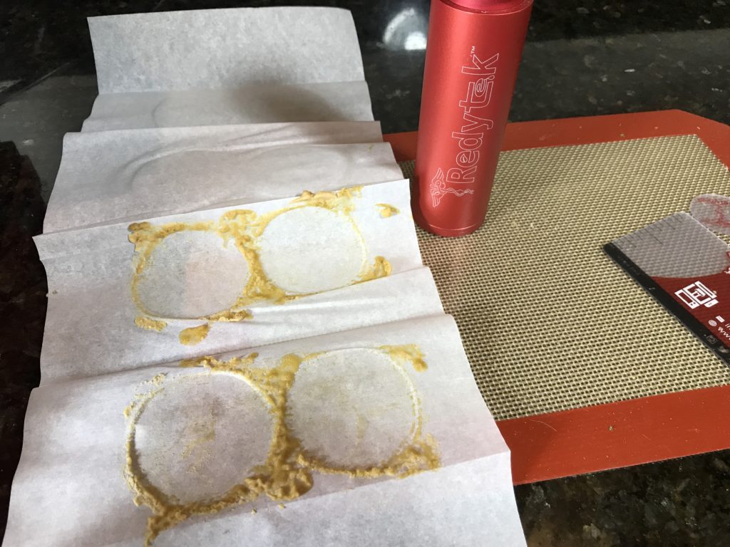 Turning Oviedo Dispensary flower into gold solventless concentrate using Rosin technique and Redytek rosin press Florida